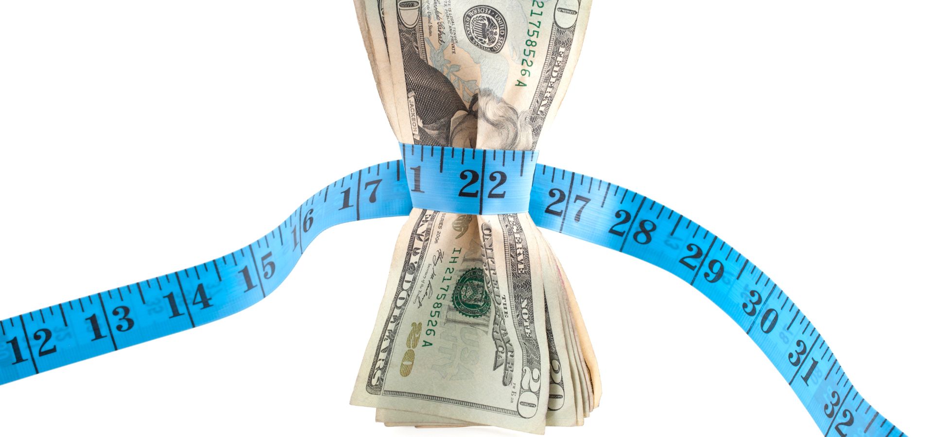money wrapped tightly with a measuring tape