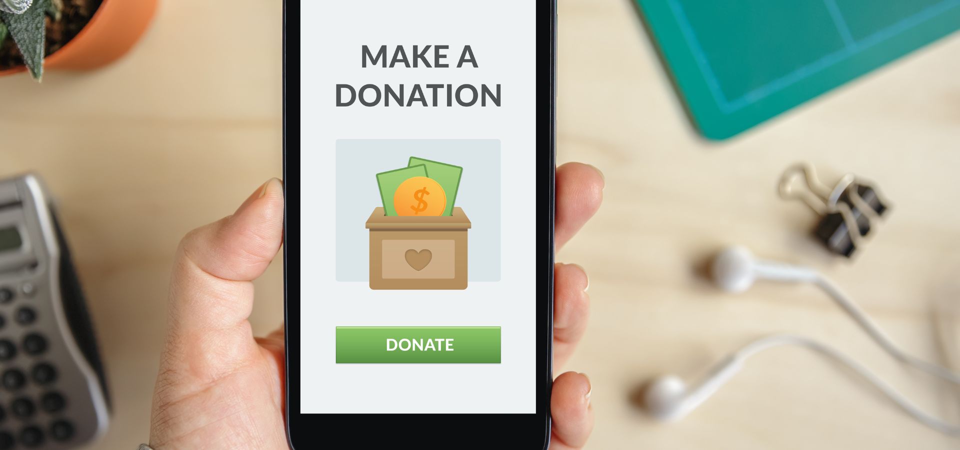 phone with donation site displayed on screen