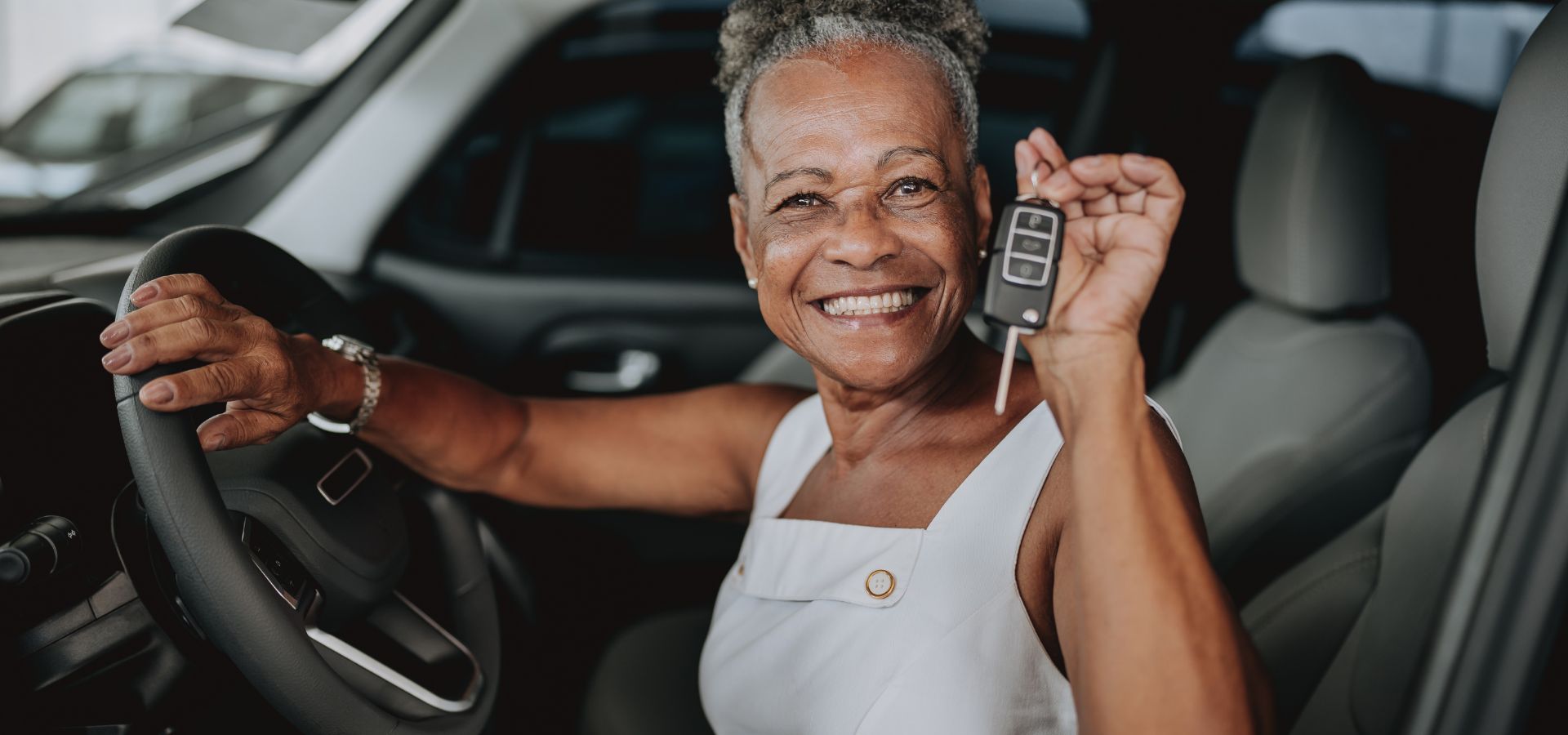 happy woman new car shopper