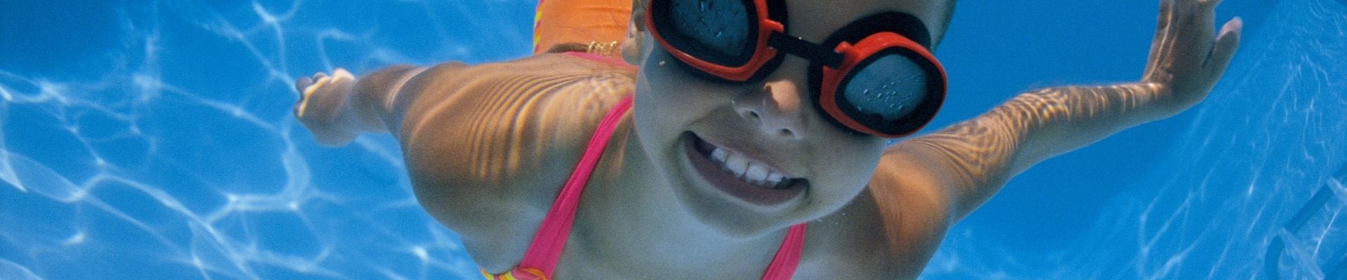 little swimming girl with goggles
